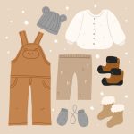 وکتور مجموعه لباس زمستانی کودک با دست طراحی شده